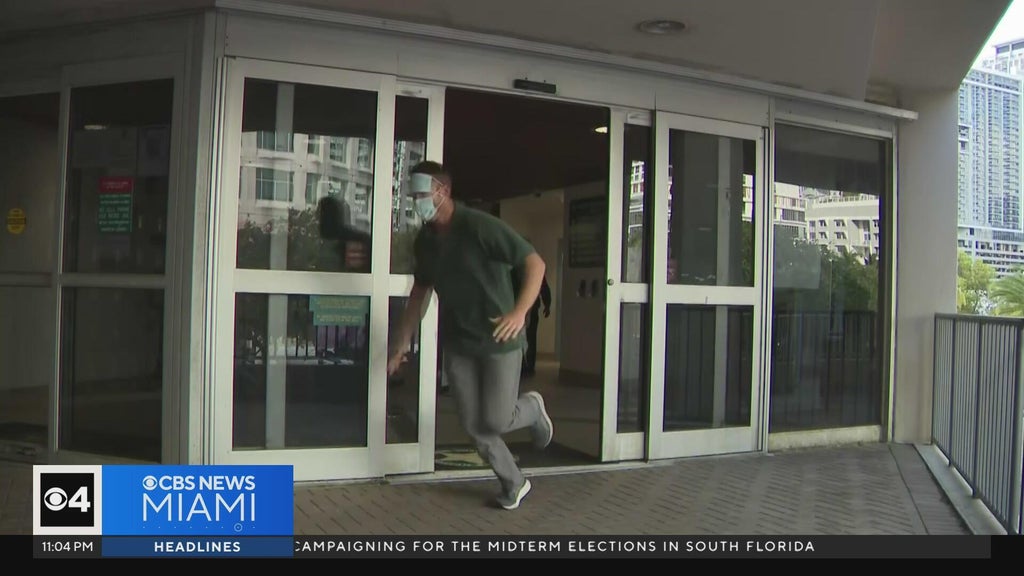 Ex-Lauderhill cop arrested for impersonating dead man runs away from cameras after release — CBS Miami, Wellington Community news