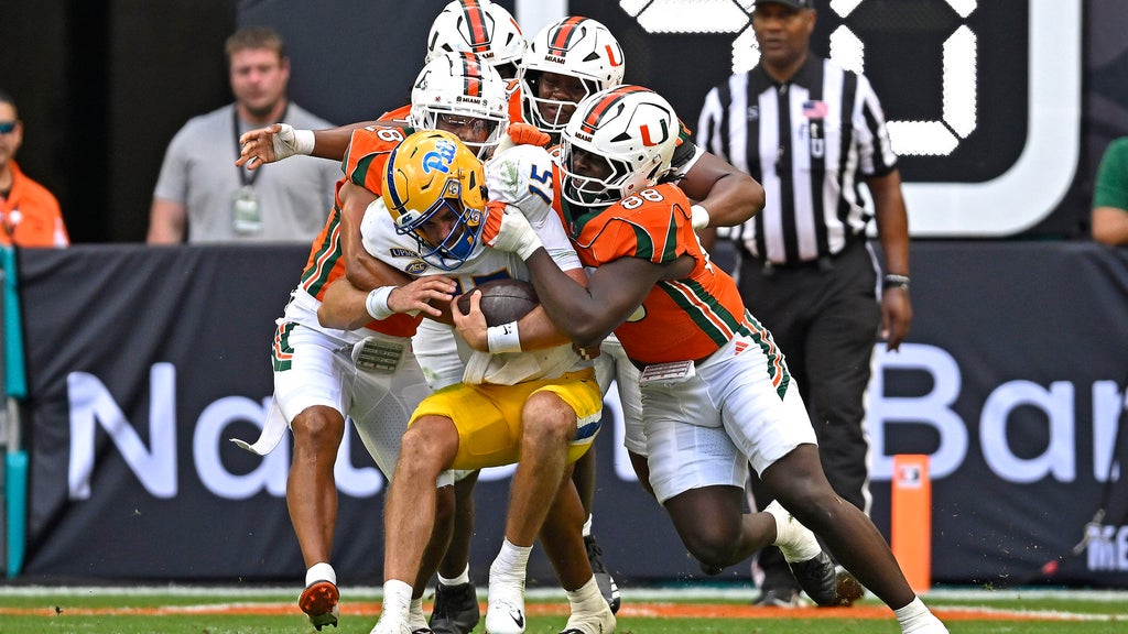 Malachi Toney's record-setting day powers No. 1 Miami past Pitt 52-23 — CBS Miami, Wellington Technology news